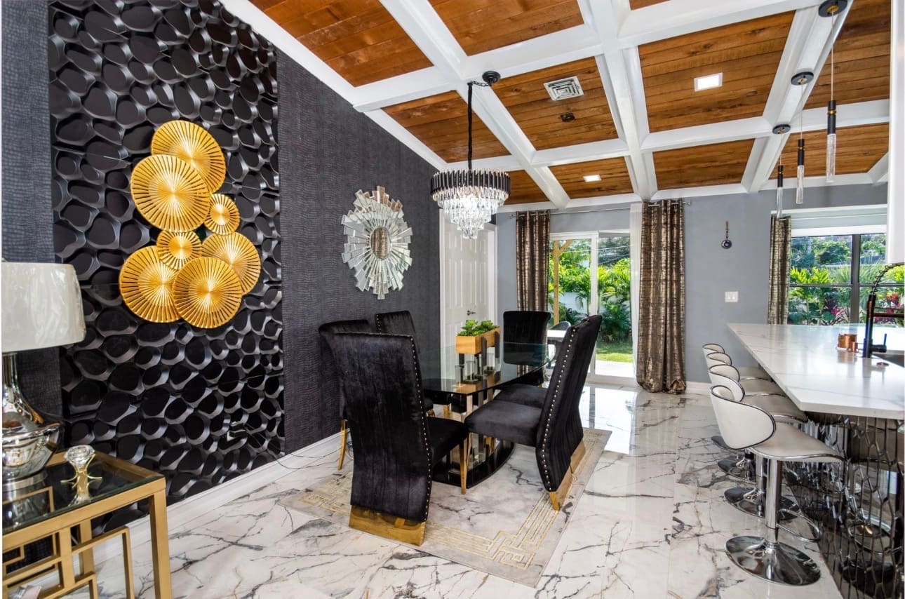 Finished dining room with custom accent wall and marble flooring — REV Home Solutions